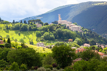 Image showing Camerino in Italy Marche over colourful fields