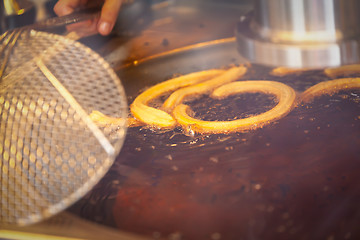 Image showing deep fry some churros