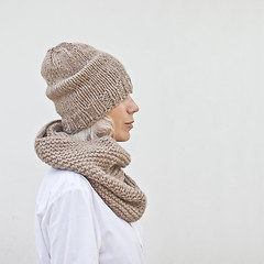 Image showing Pretty young woman in warm brown knitted hat and snood.