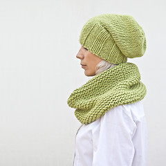 Image showing Pretty young woman in warm green knitted hat and snood. 