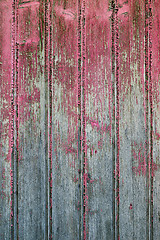 Image showing Old wooden pink door grunge texture.