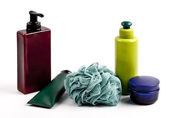 Image showing Bath cosmetic products and sponge on white background.