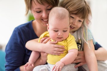 Image showing portrait of young mother with  her kids