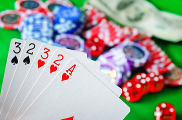 Image showing Card for poker in the hand, chips and card for poker