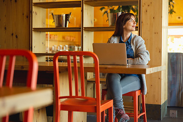 Image showing Woman working on a laptop 