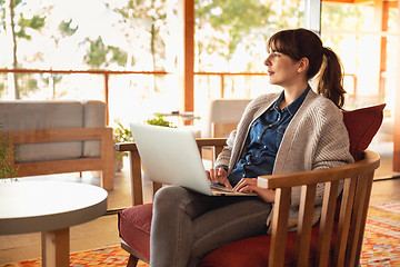 Image showing Woman working on a laptop 