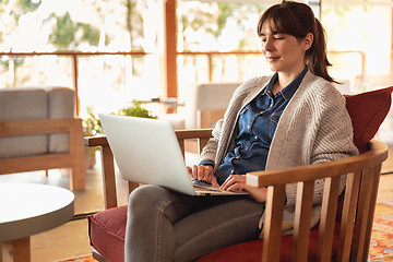 Image showing Woman working on a laptop 