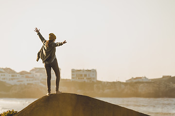 Image showing Woman over the cliff