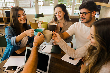 Image showing Students making a toast