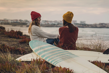 Image showing Surfer girls at the beach