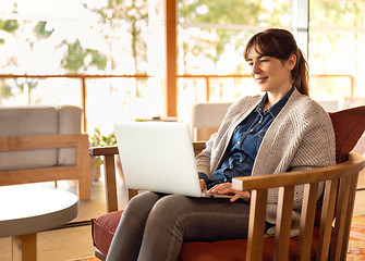 Image showing Woman working on a laptop 