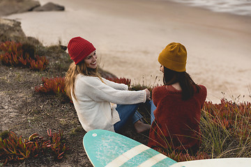 Image showing Surfer girls at the beach