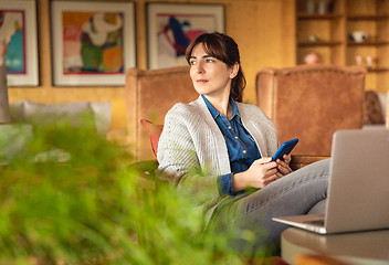 Image showing Woman working on a laptop 