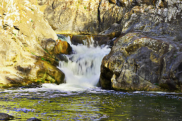 Image showing beautiful waterfall over rocks