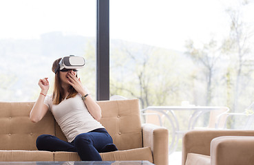 Image showing woman using VR-headset glasses of virtual reality