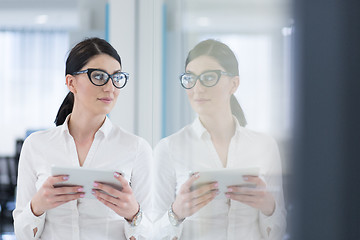 Image showing Business Woman Using Digital Tablet in front of startup Office