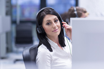 Image showing female call centre operator doing her job