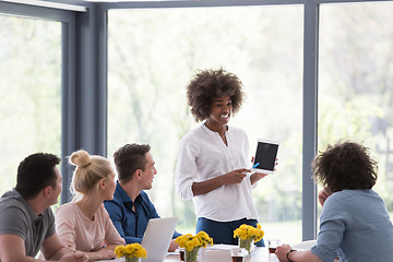 Image showing Multiethnic startup business team on meeting