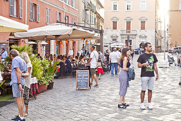 Image showing Ancona, Italy - June 8 2019: People enjoying summer day and food