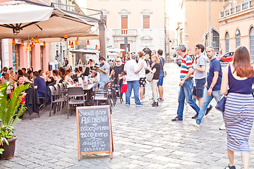 Image showing Ancona, Italy - June 8 2019: People enjoying summer day and food