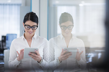 Image showing Business Woman Using Digital Tablet in front of startup Office