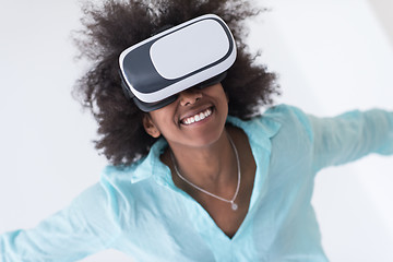 Image showing black girl using VR headset glasses of virtual reality