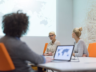 Image showing Startup Business Team At A Meeting at modern night office buildi