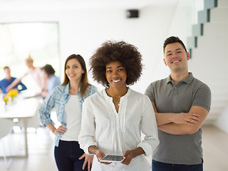 Image showing Multiethnic startup Business Team At A Meeting at modern office 