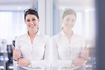 Image showing Business Woman Using Digital Tablet in front of startup Office