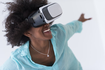 Image showing black girl using VR headset glasses of virtual reality