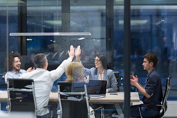 Image showing startup Group of young business people celebrating success