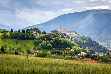 Image showing Camerino in Italy Marche over colourful fields