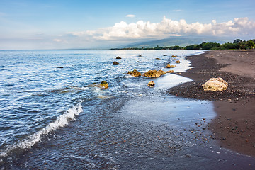 Image showing a dark sand beach in northern Bali Indonesia