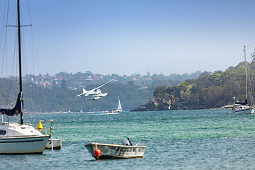 Image showing plane flying over the ocean in Sydney Australia