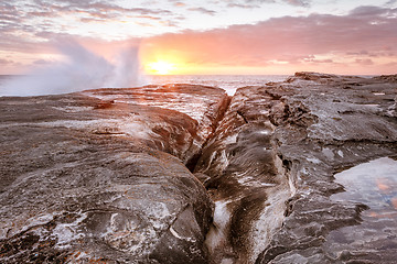 Image showing Waves splash up onto rocks on coast of Sydney