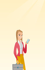Image showing Caucasian business woman holding a mobile phone.