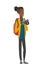 Image showing African nature photographer with digital camera.