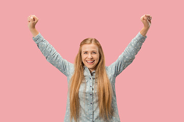 Image showing Winning success woman happy ecstatic celebrating being a winner. Dynamic energetic image of female model