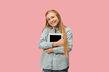 Image showing The happy businesswoman with red laptop on pink