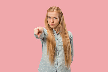 Image showing The overbearing business woman point you and want you, half length closeup portrait on pink background.