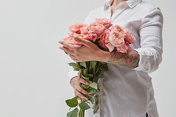 Image showing Girl with bouquet of flowers