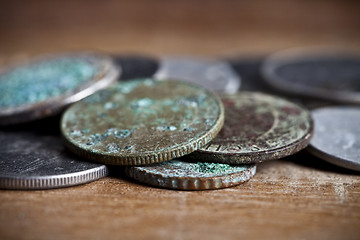 Image showing Pile of different ancient copper coins with patina.