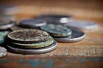 Image showing Pile of different ancient copper coins with patina.