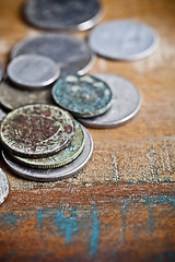 Image showing Pile of different ancient copper coins with patina.