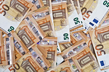 Image showing Fifty euro banknotes background. 50€ currency notes.