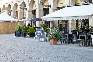 Image showing Fermo, Italy - June 23, 2019: Summer day and utdoor restaurant