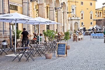 Image showing Fermo, Italy - June 23, 2019: People enjoying summer day and foo