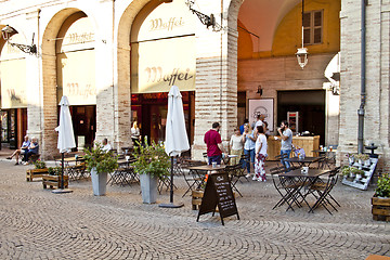 Image showing Fermo, Italy - June 23, 2019: People enjoying summer day and foo