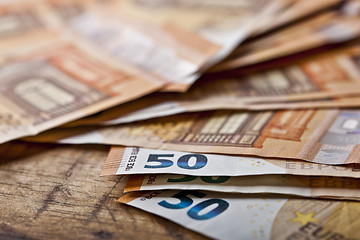 Image showing Pile of fifty euro banknotes.