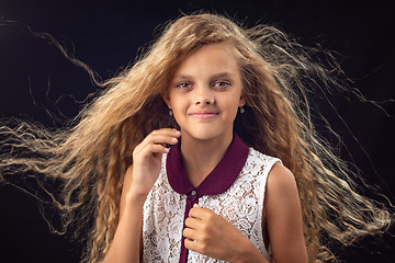 Image showing Portrait of a girl with developing hair